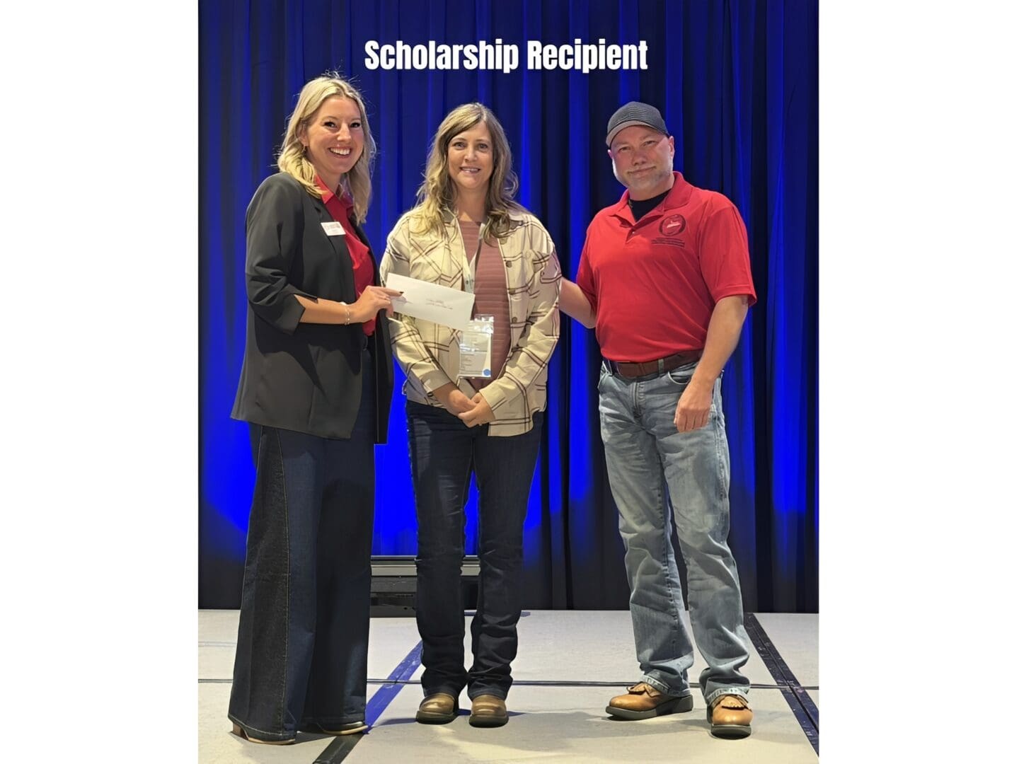 Group celebrating scholarship recipient